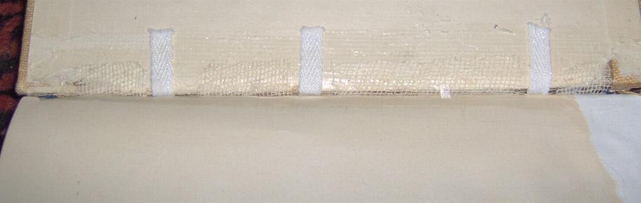 Shows tapes and tabs glued in place.